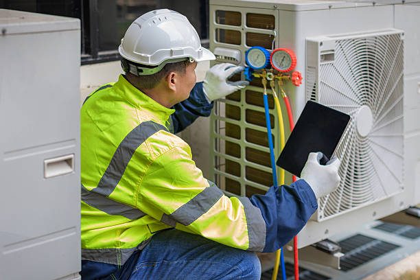 Professional Heat Pump Repair technician working in Elm Mott, TX